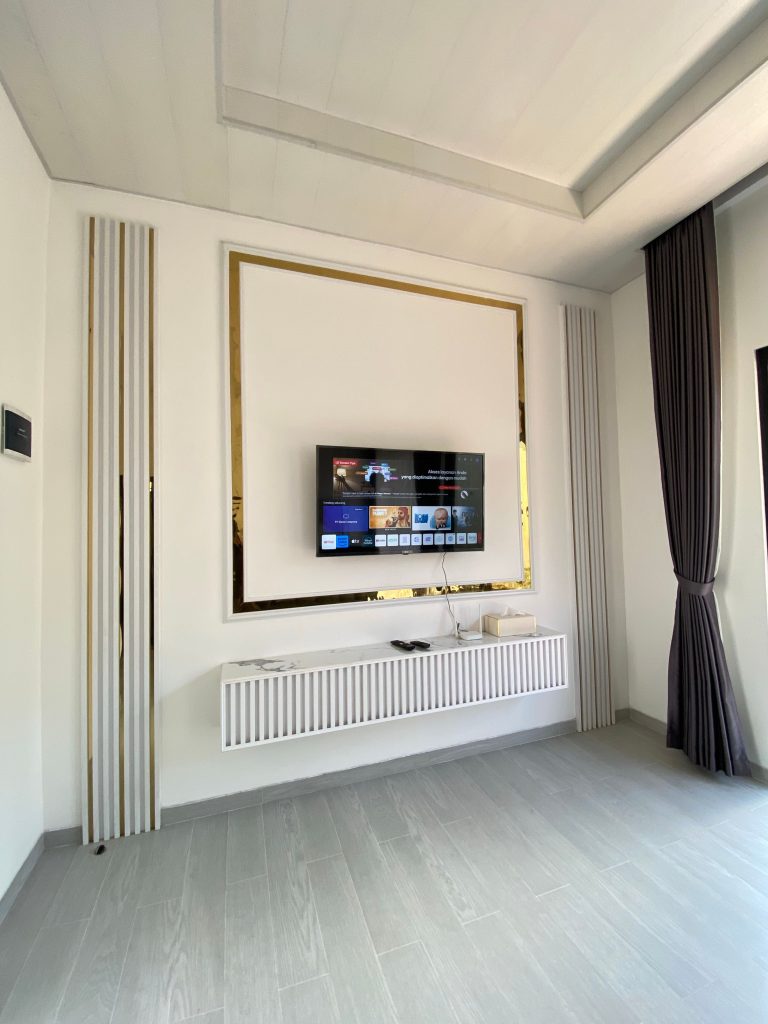 Modern living room with wall mounted TV